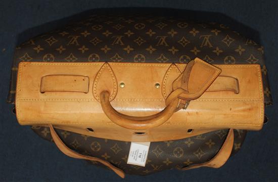 A Louis Vuitton travel bag, length 22in. not incl. handle